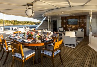 alfresco dining on the main deck aft of luxury yacht ‘Blue Moon’ 