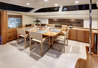 formal dining in main salon aboard superyacht DANNESKJOLD