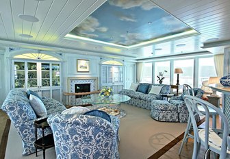 main salon bella vita yacht with cloud fresco ceiling