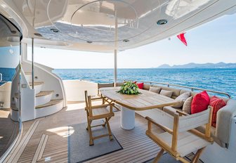 alfresco dining area on the aft deck of charter yacht ‘Excelerate Z’ 