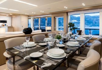 formal dining area in the main salon of motor yacht K