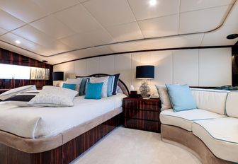 Owner's cabin motor yacht HEMILEA, with corner sofa and cream colour palette