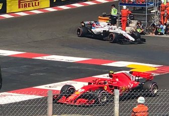 Two Formula 1 cars racing at the Monaco Grand Prix 2018