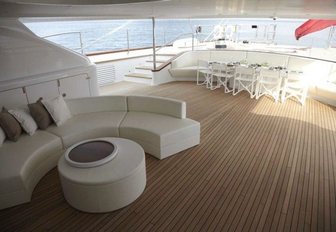 alfresco dining and shaded lounge on board charter yacht PANTHALASSA