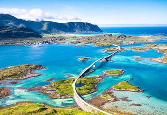 blue waters and green islets either side of the Atlantic Road in Norway