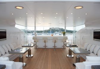sheltered bar and seating areas on the sundeck of luxury yacht Hurricane Run’