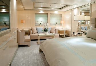 sleeping quarters of the light and airy master suite aboard luxury yacht ‘Step One’ 