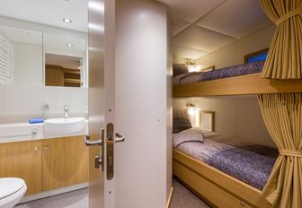 a cabin for crew or support staff on board charter yacht Game Changer 