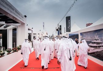 Official show openers walk the boardwalks at the Dubai International Boat Show 2018