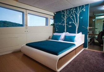 A stateroom on board luxury charter yacht JOYME