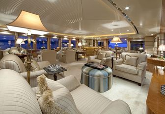 Sofas in main salon lounge area on board luxury yacht huntress