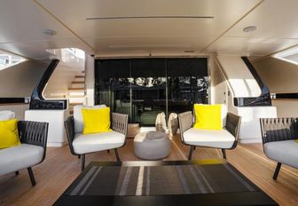seating area on the aft deck of charter yacht December Six 