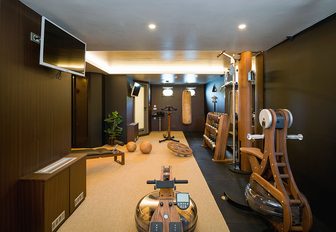 Overview of a gym onboard charter yacht AGAPE ROSE