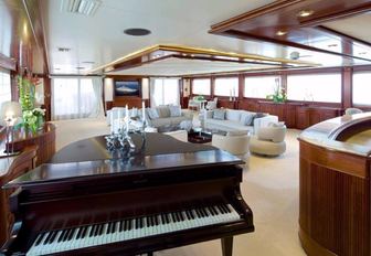 The grand piano featured in the main salon of luxury yacht O'MEGA