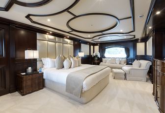 timeless interior styling of master suite on board charter yacht ELENI