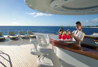 bar and sun loungers on sundeck of luxury yacht huntress