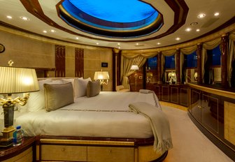 master suite with skylight above bed and forward views on board motor yacht Mine Games