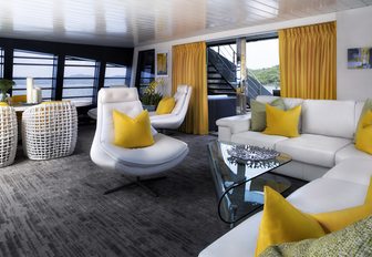 L-shaped sofa and arm chairs in the skylounge aboard charter yacht ‘Ocean Emerald’ 