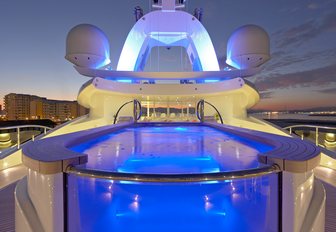 Sun deck pool on luxury yacht AMARYLLIS