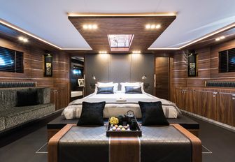 spacious master suite with walnut walls aboard charter yacht ‘Rox Star’ 