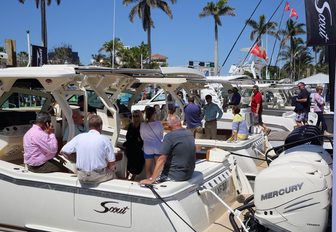 show-goers check out the yachts at the Palm Beach Boat Show 2018