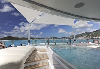 swimming pool and Jacuzzi on sundeck of superyacht TV