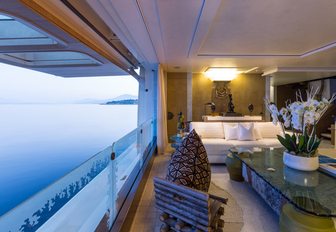 seating area in the main salon aboard luxury yacht Coral Ocean with cutaway bulwark