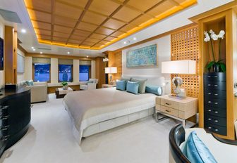 master suite with large bed and windows on board charter yacht HANIKON 