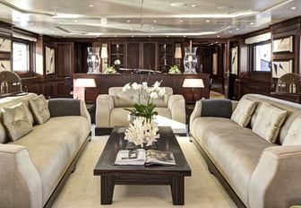 sofas forming a sociable seating area in the main salon of luxury yacht Azteca II