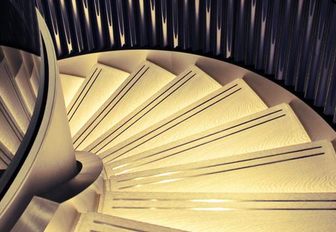 The illuminated staircase featured in the interior of superyacht Odessa II