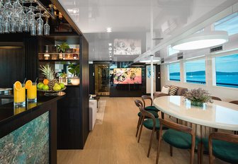Interior dining area onboard charter yacht AGAPE ROSE