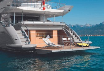 drop-down swim platform forms a chic beach club on board charter yacht ‘H
