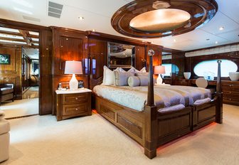 master suite with rich wooden joinery aboard luxury yacht ‘Sweet Escape’