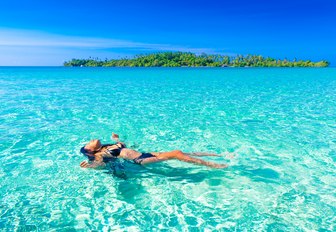 woman swimming in Fiji