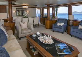 main salon with welcoming lounge aboard superyacht ‘Chasing Daylight’