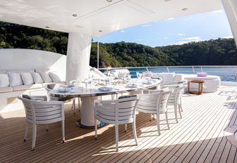 alfresco dining area under the radar arch on board luxury yacht ‘Step One’ 
