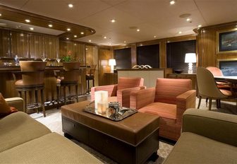 sumptuous seating and bar in the skylounge of charter yacht WILDFLOUR 