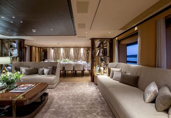 warm and modern styling in the main salon of luxury yacht VERTIGE 