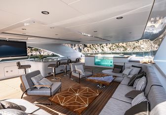 Sundeck on superyacht LILIUM, with pool, seating area 