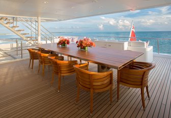 Alfresco dining on aft deck of charter yacht Dream
