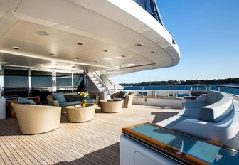 alfresco seating area on the main deck aft of charter yacht VICTORY