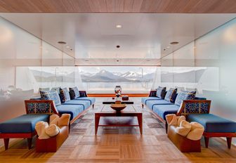 chic beach club with comfortable lounging area aboard motor yacht ‘Party Girl’ 
