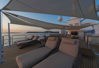 chaise loungers line up on sundeck of luxury yacht Mine Games 