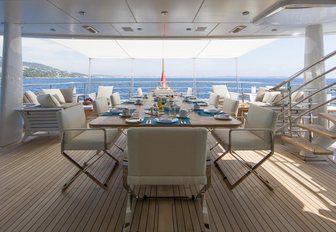 alfresco dining on the upper deck aft of charter yacht 4YOU
