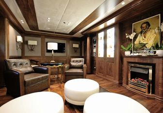 whiskey lounge with fireplace on board luxury yacht KATINA 