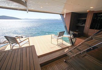 teak-clad swim platform with two deck chairs aboard superyacht ‘Rox Star’ 