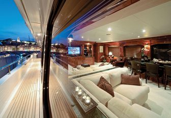 view of classically-styled skylounge from side deck of motor yacht ‘One More Toy’ 