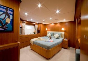 teak-clad master suite aboard superyacht KAWIL