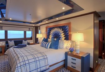 modern master suite with blue and white colour palette on board motor yacht CYNTHIA