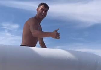 Football legend Cristiano Ronaldo goes down slide on his yacht